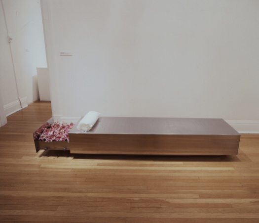 Drawer where the stargazer lilies are stored is opened to reveal the lilies that fill the Soares piece Fainting Couch